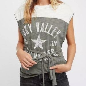 Free People Sky Valley Wildcats raw edge wrap waist top; size S